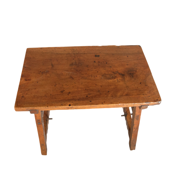 Antique trestle leg accent table with iron stretchers, walnut
