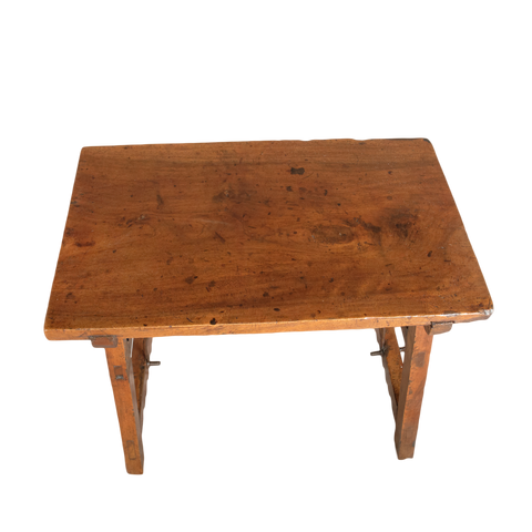 Antique trestle leg accent table with iron stretchers, walnut