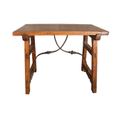 Antique trestle leg accent table with iron stretchers, walnut