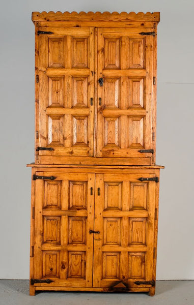 Antique scalloped cornice four door Pyrenees cabinet, pine