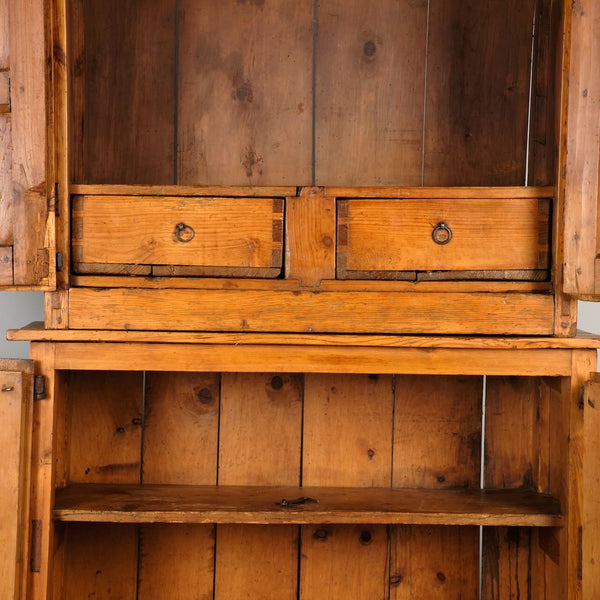 Antique scalloped cornice four door Pyrenees cabinet, pine