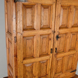 Antique scalloped cornice four door Pyrenees cabinet, pine