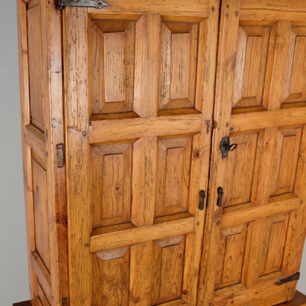 Antique scalloped cornice four door Pyrenees cabinet, pine