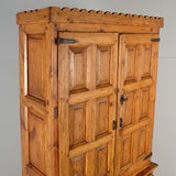 Antique scalloped cornice four door Pyrenees cabinet, pine