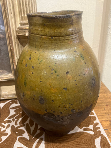 Single-handle, semi-glazed olive green oil pitcher