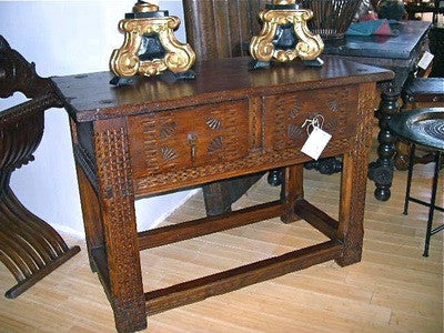 Carved two-drawer "Aragonese" table