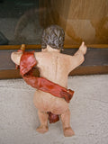 Pair of small carved and painted antique cherubs