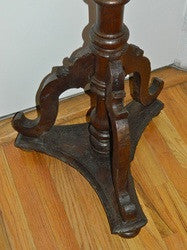 Antique tripod floor candlestick with gilt metal bobeche