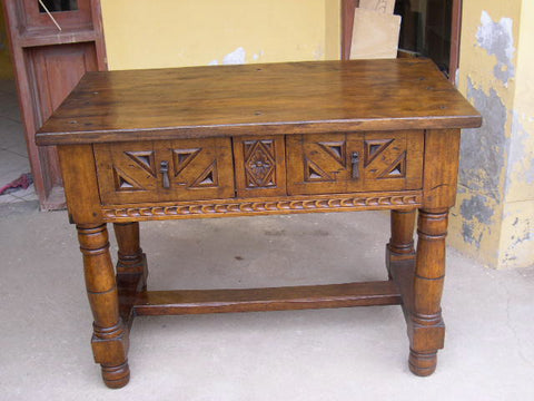 Reproduction custom-made two-drawer, two-door carved credenza based on a 17th century Spanish table