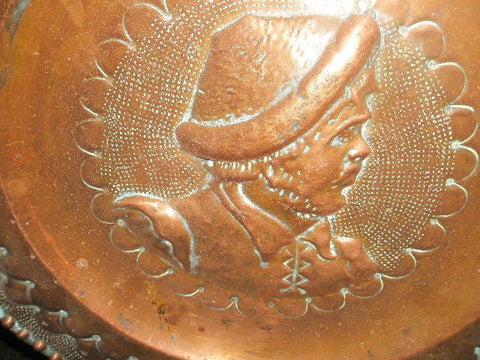 Antique embossed copper tavern plates