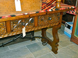 Carved three-drawer table