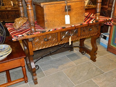 Carved three-drawer table