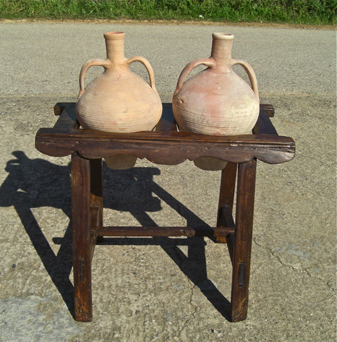 Antique two-hole poplar water jug stand with original clay jugs