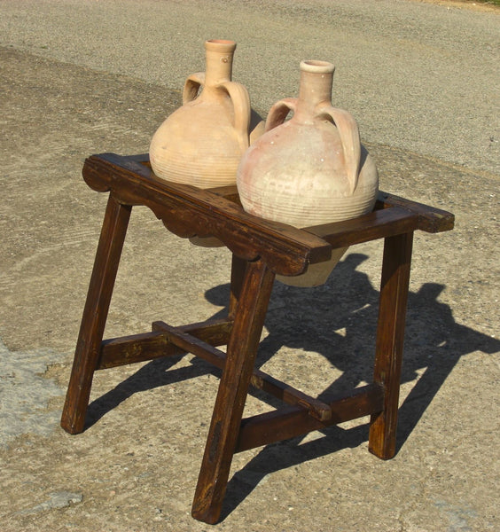 Two-hole pine water jug stand with original clay jugs