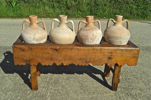 Antique scalloped skirt four-hole pine water jug stand with original clay jugs