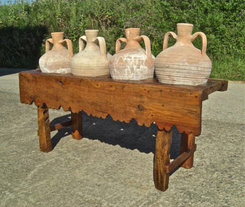 Antique scalloped skirt four-hole pine water jug stand with original clay jugs