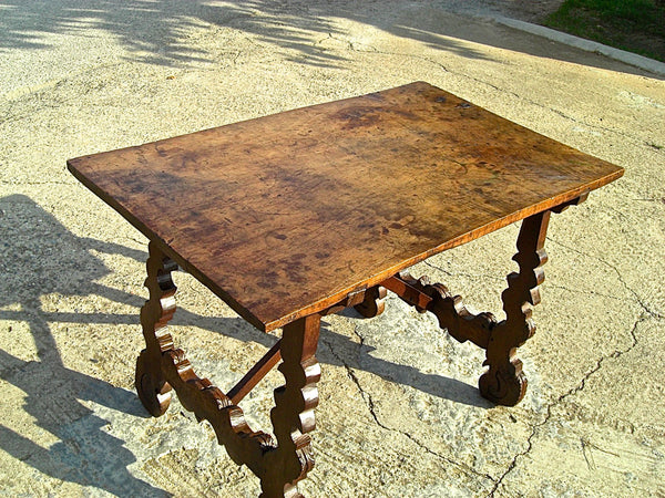 Antique scalloped lyre-leg library table with wooden stretchers, walnut