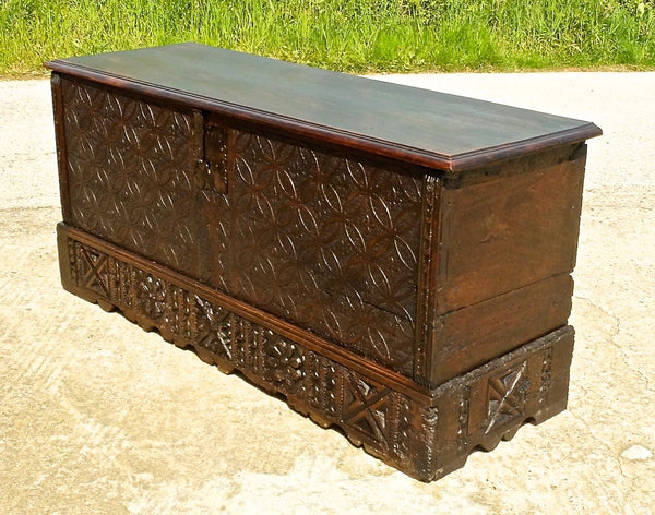 Antique Basque arms chest with carved skirt, chestnut