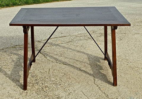 Antique trestle-leg campaign table with iron stretchers, walnut