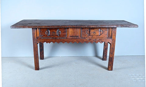 Antique carved two-drawer mixed wood scalloped skirt library table