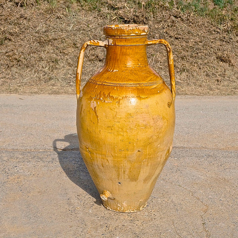 Antique semi-glazed terracotta olive oil jar