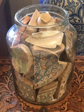 Glass jar of painted antique ceramic fragments