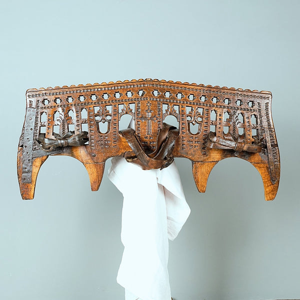 Carved antique oxen yoke with leather straps