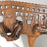 Carved antique oxen yoke with leather straps