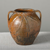 Antique two handle semi-glazed pot with braided decoration