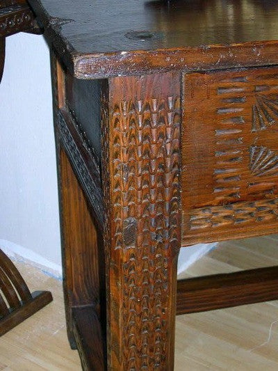 Carved two-drawer "Aragonese" table