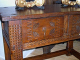 Carved two-drawer "Aragonese" table