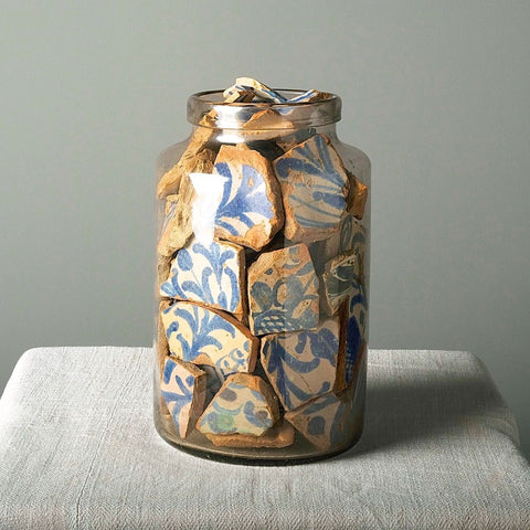 Glass jar filled with antique Andalusian marble and tile fragments