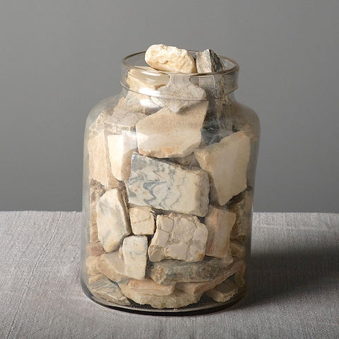 Glass jar filled with antique “Fajalauza” majolica fragments