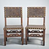 Pair of antique tooled leather Spanish colonial chairs, walnut