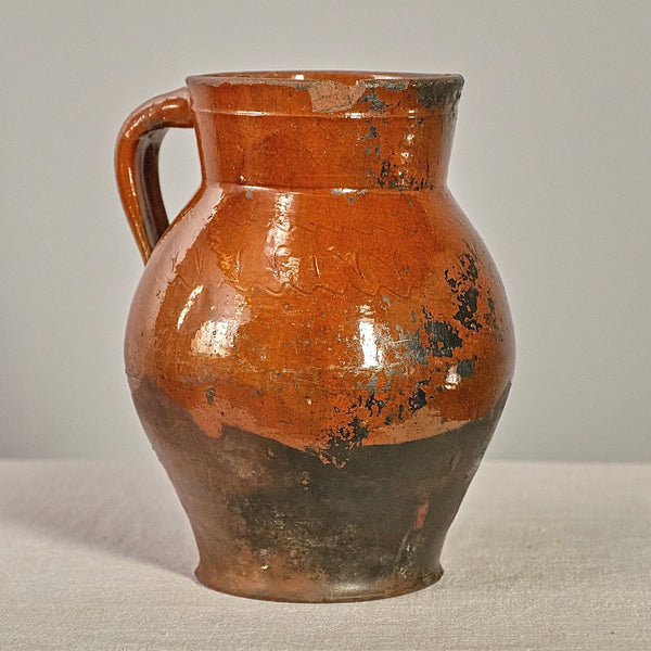 Antique incised semi-glazed wine pitcher