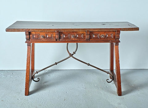 Antique trestle leg three-drawer “Burgalés” table with iron stretchers, walnut