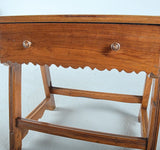 Antique trestle leg game dressing table with scalloped drawer, walnut