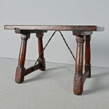 Antique mast leg accent table with iron stretchers, walnut