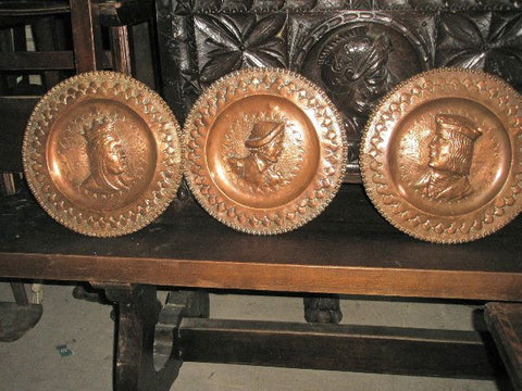 Antique embossed copper tavern plates