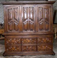Carved two-door, two-drawer antique apothecary cabinet, cherry