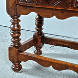 Antique low turned leg table with carved drawer, walnut