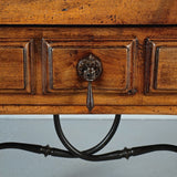 Small antique trestle leg accent table with paneled drawer, walnut