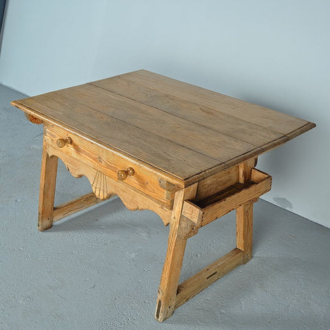 Antique scalloped skirt trestle leg table with drawer