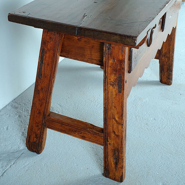 Antique two-drawer mixed wood Castilian trestle leg table