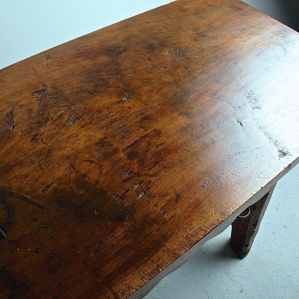 Antique two-drawer mixed wood Castilian trestle leg table