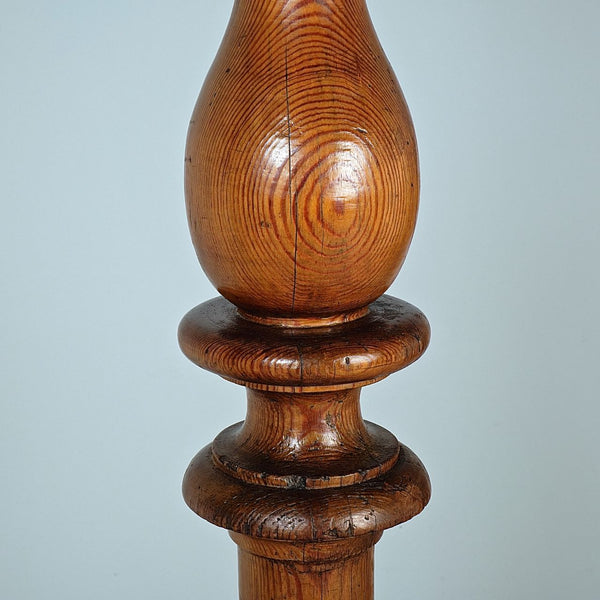 Antique pair of large turned floor candlesticks, pine