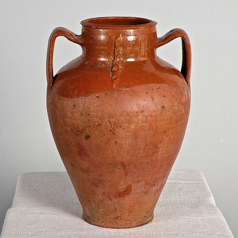 Large antique two-handle braided semi-glazed red clay jar