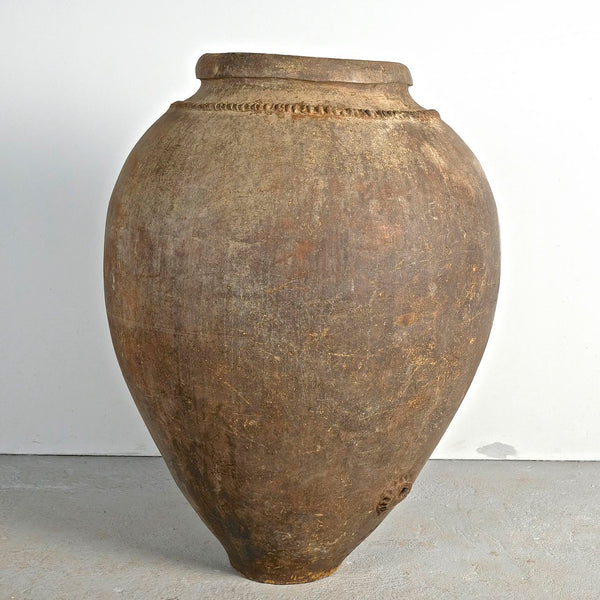 Antique large rolled neck olive oil jar with crimped motif