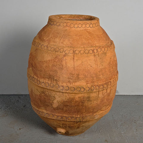 Antique terracotta oil jar with red iron oxide streaking