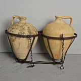 Antique two jug wrought iron carrier